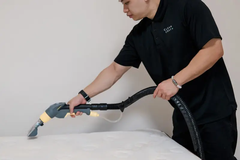 A Cleancraft cleaner steam-cleaning a mattress